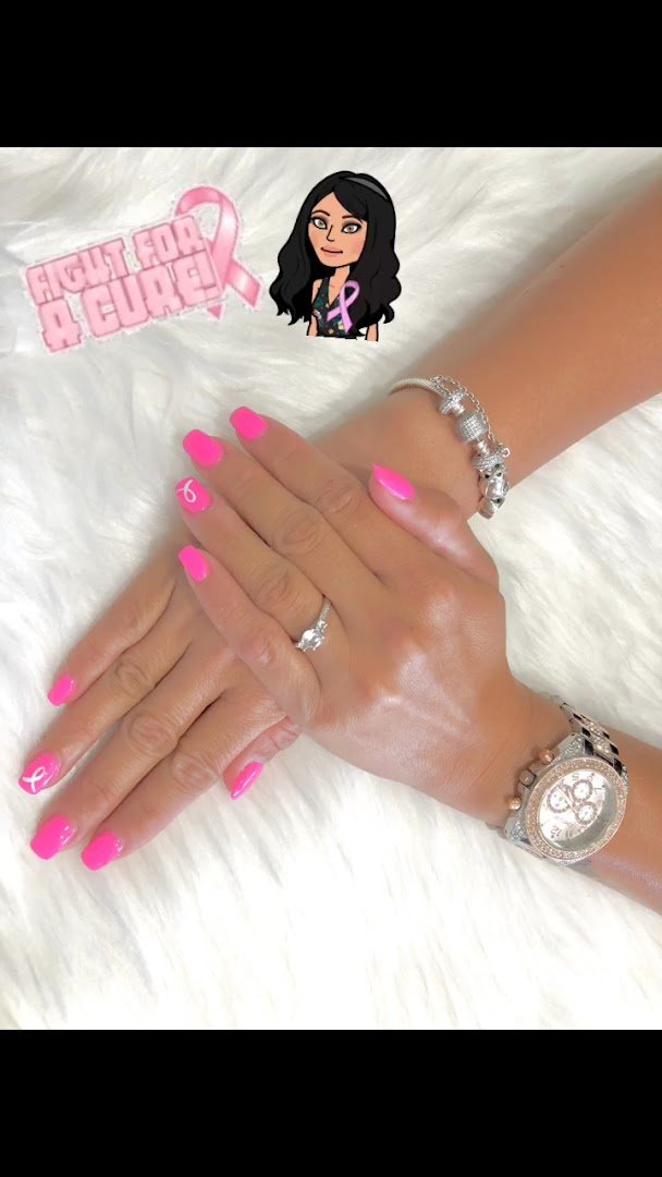 Polished nails displayed in a salon setting.